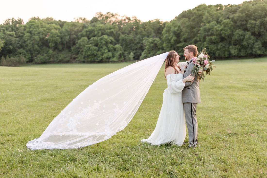 Bride and Groom in Field at Cedarmont Farm 