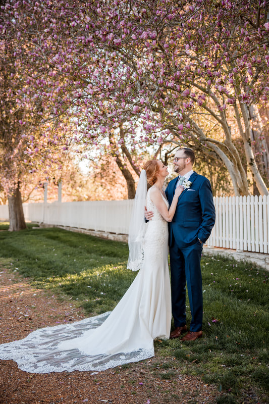 Trees blooming with bride and groom at Cedarmont Farm 