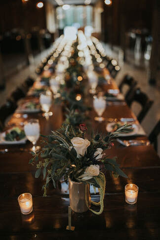 tablescape at indoor barn wedding